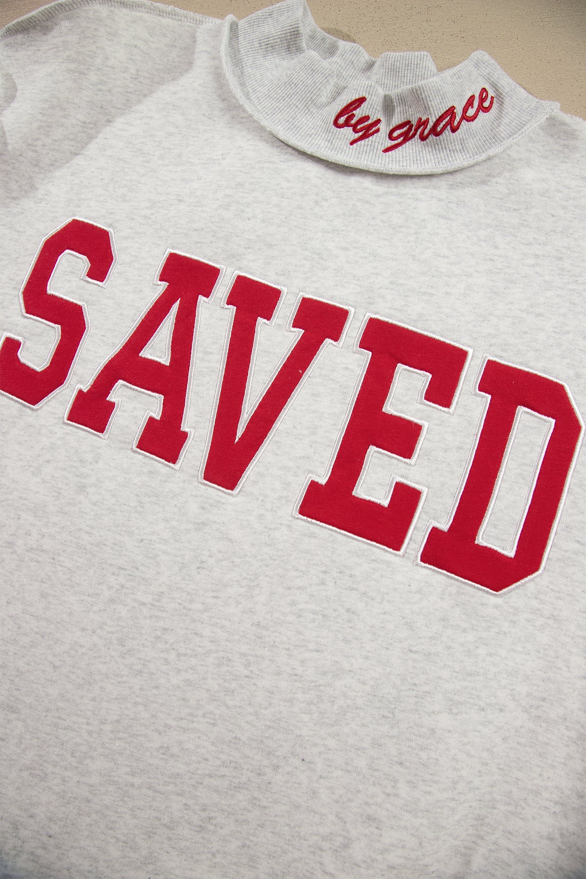 Saved By Grace Embroidered Mock Neck Sweatshirt