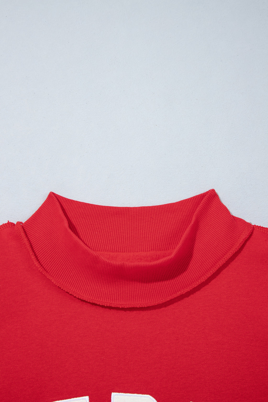 MERRY Embroidered Mockneck