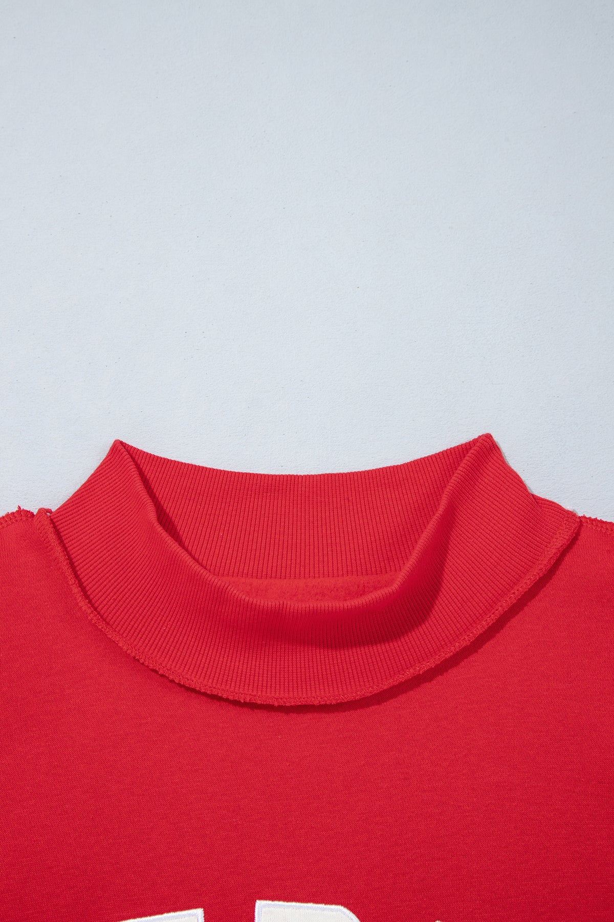 MERRY Embroidered Mockneck